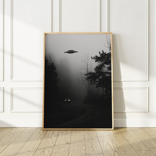 Flying saucer (UFO) above a car in a forest Poster, Black and White Photography print